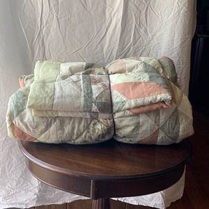 Full size quilt with two pillow shams.